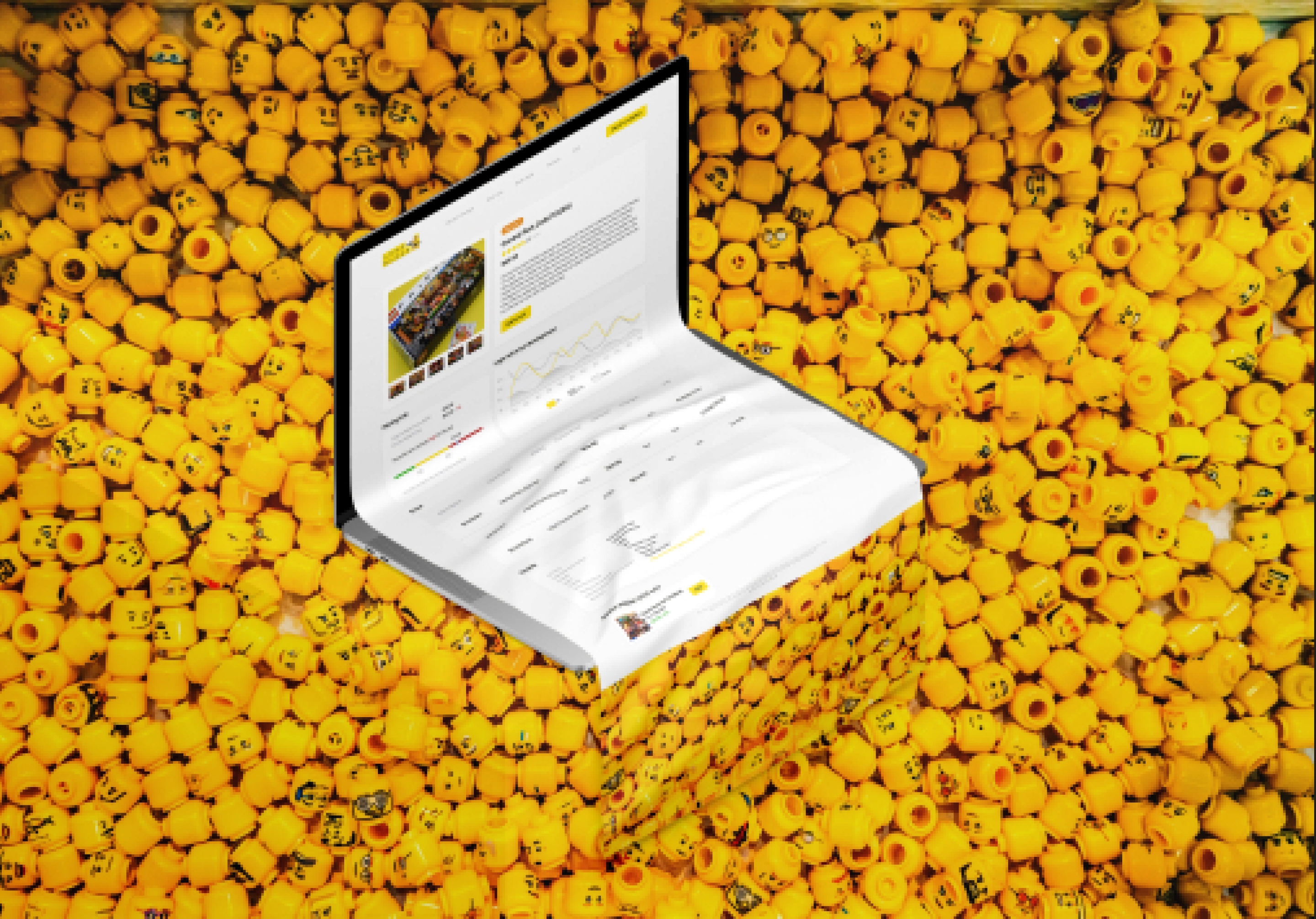 Laptop with LEGO Block on a pile of minifigure heads
